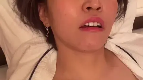 Asian Teen Pleasures Herself on Bed