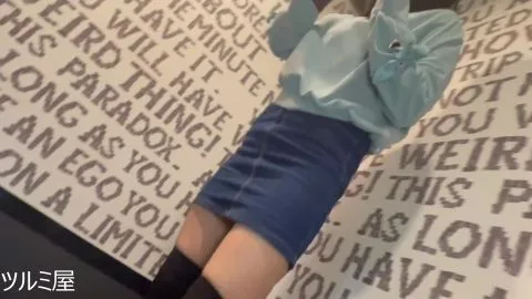 Asian Brunette in Stockings on Escalator