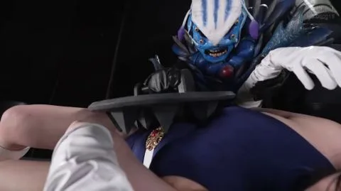 Asian Girl in Blue Dress Captured by Creature