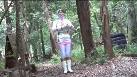 Asian woman in white and gold costume