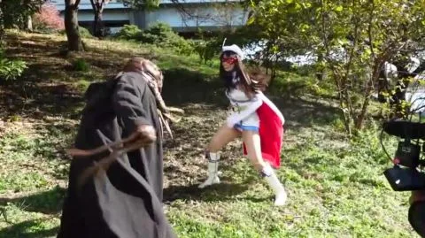 Asian Cosplay Fight Scene with Topless Model