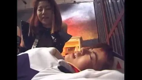 Asian Lesbians in Costume BDSM Scene