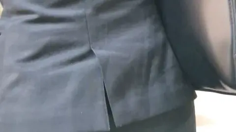 Asian Businesswoman in Black Suit