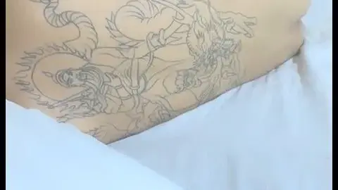 Intimate Couple Embrace in Bed