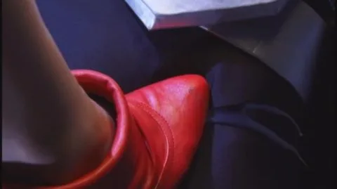 Red Masked Beauty in Restraint