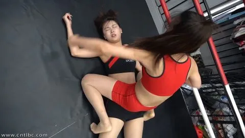 Asian Women Wrestling in Ring