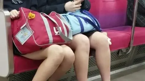 Schoolgirls on Subway Ride