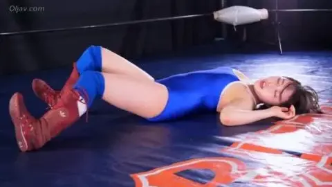 Asian Couple in Boxing Ring Intimacy