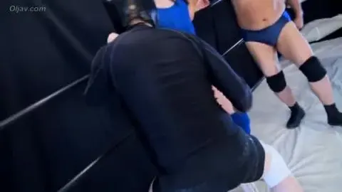 Asian Wrestlers Engage in Intense Matches