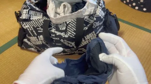 Asian Teen Undresses in Living Room