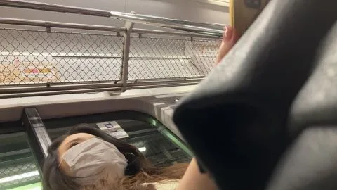 Asian Girl in Mask on Escalator and Elevator