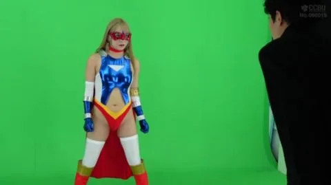 Blonde in Superhero Costume and Business Attire Erotica