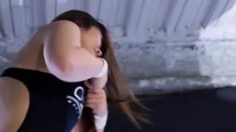 Asian Women Wrestling in Ring