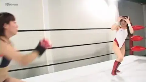 Asian Women Wrestling in Ring