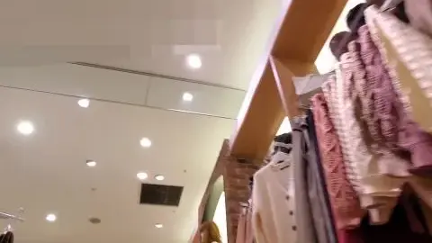Asian Girls in Clothing Store
