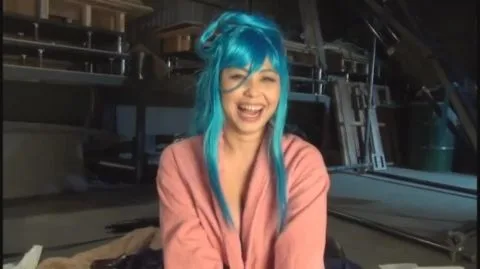 Asian Teen with Colorful Hair in Intimate Moments