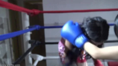 Asian Women Boxing in Ring