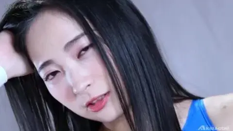 Asian Wrestlers in Red and Blue Leotards