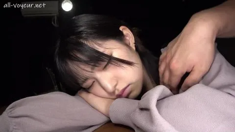 Asian woman seduced in dimly lit room