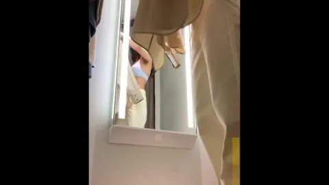 Girls Trying On Clothes And Interacting