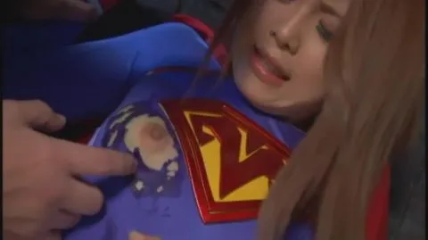 Asian Couple in Superman Costume Intimate Moments