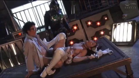 Asian Performers in Futuristic Bondage Scenes