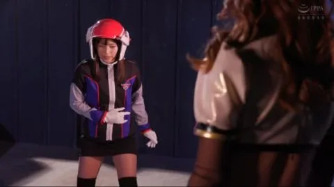 Asian Women in Racing Suits and Costumed Characters