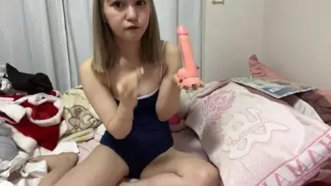 Blonde Asian Teen with Tattoo Plays with Sex Toys
