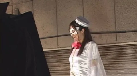 Asian Performers in Costumes and Face Paint