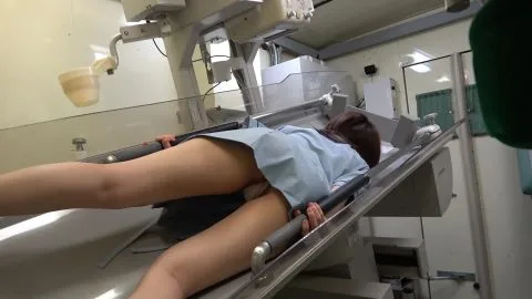 Dark-Haired Girl in Medical Exam