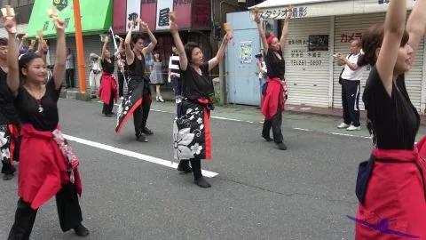Asian Performers Dancing in the Street