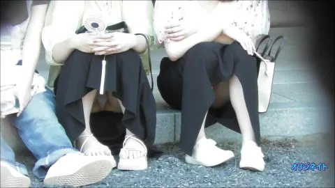 Asian Women in Black Skirts Outdoors