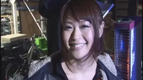 Asian Brunette in Black Clothing and Leather Jacket