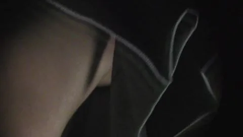 Asian Teen Undresses and Engages in Foreplay