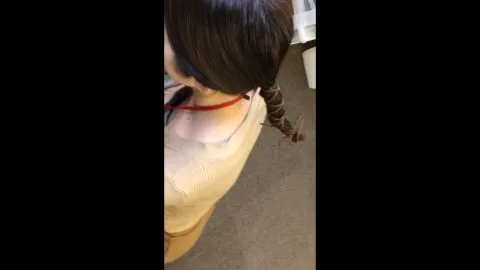 Asian teen plays with red cord