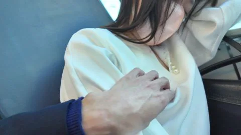 Asian Woman Exposed in Intimate Car Scene