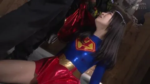 Asian Woman in Superman Costume Engages in Intimate Acts