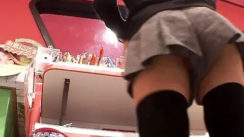 Blonde in Stockings Teases in Clothing Store