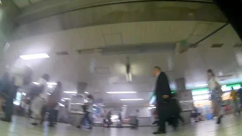 Asian teen on train stairs POV