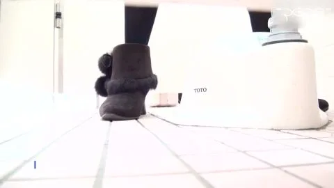 Asian teen in boots urinates in bathroom