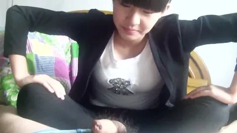 Asian and Caucasian Duo Intimate Footjob Scene