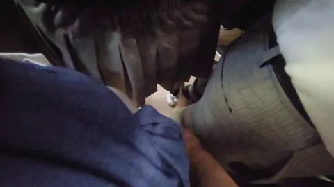 Caucasian Men Intimate Moments in Crowded Space