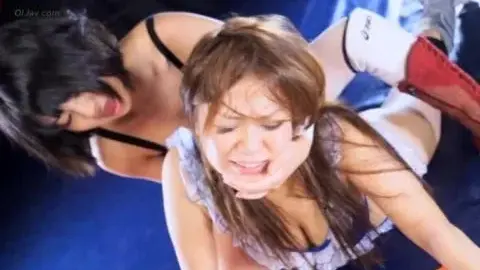 Asian Lesbians Wrestling in Ring