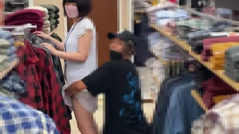 Asian Women Shopping in Clothing Store