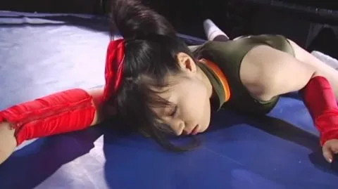 Asian Woman in Leotard Wrestling