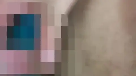 Asian girl waxing in bathroom