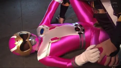 Asian Performers in Pink and Gold Costumes