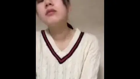 Asian Teen with Short Black Hair in Bedroom