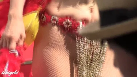 Asian Performer in Beaded Bikini Top and Accessories