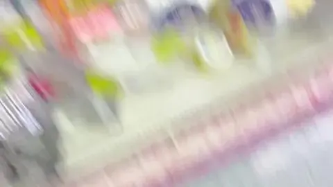 Asian Man in Plaid Shirt Shopping